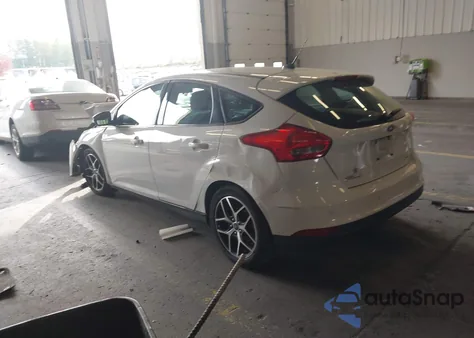 2018 Ford Focus Sel z USA, uszkodzony, nr VIN 1FADP3M21JL231019